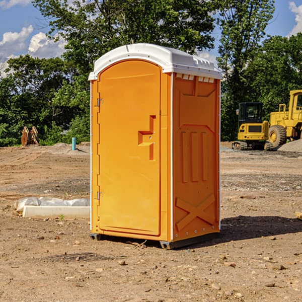 what is the cost difference between standard and deluxe portable toilet rentals in East Vincent